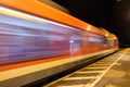 Abstraction - the train moves quickly along the platform Royalty Free Stock Photo