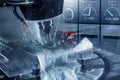 The abstracts scene of 5-axis CNC milling machine and monitor gauge cutting the tire mold parts by solid ball endmill tools. Royalty Free Stock Photo