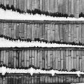 Abstration with wooden fence and snow