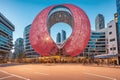 absurd building skyscraper in donut shape in the city, Organic modernist architecture illustration Ai Generated