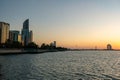 Abu Dhabi buildings skyline In evening at sunset Royalty Free Stock Photo