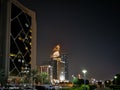 Abu Dhabi city famous towers from corniche street at night