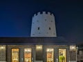 Abu Dhabi city old historic building gate at night next to a restaurant- United Arab Emirates heritage . Royalty Free Stock Photo