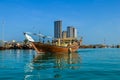 Abu Dhabi city skyline along Corniche beach taken from a boat