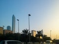 Abu Dhabi city skyline towers view at golden hour sunset - corniche view Royalty Free Stock Photo