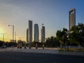 Abu Dhabi city streets, beautiful view of famous Etihad towers at sunset