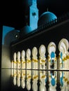 Abu Dhabi Sheik Zayed Mosque beautiful details and architecture with reflections on water at night