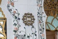 Abu Dhabi, UAE - April 2. 2019. A clock showing the time of namazin Sheikh Zayd Grand Mosque