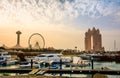 Abu Dhabi, UAE - April 27, 2018: Sunset over Al Marina island in Royalty Free Stock Photo