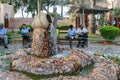 Abu Dhabi, UAE, January 10, 2019: Unusual fountain in shape of jug in Emirates Heritage village
