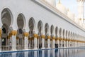 Abu Dhabi, UAE - March 31. 2019. Fragment of Colonnade of Sheikh Zayd Grand Mosque Royalty Free Stock Photo