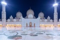 Abu Dhabi, UAE - March 26, 2014: Sheikh Zayed Grand Mosque in Abu Dhabi at dusk, UAE. Grang Mosque in Abu Dhabi is the largest Royalty Free Stock Photo