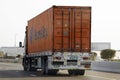 Abu Dhabi, United Arab Emirates - April 12, 2023 logistics container transporting on sheikh zayed road