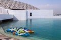 The exterior of the famous Louvre museum with the floating and perforated roof in Abu Dhabi.