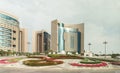 View from the window of a tourist bus on the impressive architecture in Abu Dhabi city, United Arab Emirates
