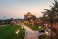 Abu Dhabi, United Arab Emirates - November 1, 2019: Emirates palace in a beautiful yard in Abu dhabi at sunset