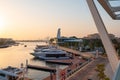 Abu Dhabi, United Arab Emirates - October 7, 2023: Sunset at Al Qana, a waterfront development in Abu Dhabi at Khor Al Maqta in