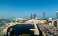 Abu Dhabi, United Arab Emirates - September 19, 2019: Abu Dhabi skyline view of the downtown buildings rising over the water Royalty Free Stock Photo