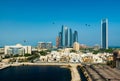 Abu Dhabi, United Arab Emirates - September 19, 2019: Abu Dhabi skyline view of the downtown buildings rising over the water Royalty Free Stock Photo