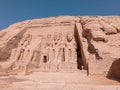 Abu Simbel, an ancient tomb carved on the stone with statues in Egypt