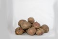 Abunch of potato and white background on the back Royalty Free Stock Photo