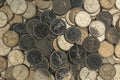 Abundance of assorted coins arranged neatly on a flat surface