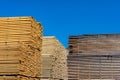 Wood planks stacked in sawmill yard