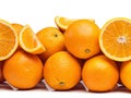 An abundance of vitamin C. Studio shot of a pile of oranges against a white background. Royalty Free Stock Photo