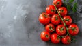 The Abundant Harvest: A SpectaculDisplay of Fresh Tomatoes on a Serene Grey Background