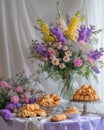 Abundant Pastries and Flowers on Table