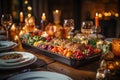 Abundant table food. Dinner. Night. Candlelight. Wine glasses. Meat, vegetables Royalty Free Stock Photo