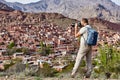 One european tourist photographing village of Abyaneh near Kashan, Iran.