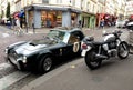 AC Cobra and Triumph motorbike Royalty Free Stock Photo