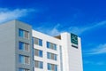 AC Hotels Marriott sign on a European inspired hotel under blue sky