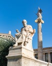 Academy of Athens - Plato Statue and Athena Column Royalty Free Stock Photo