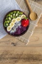 Acai bowl with napkin and spoon Royalty Free Stock Photo