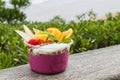 Acai bowl takeaway with fresh fruit and mint