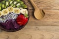 Acai bowl and wooden spoon Royalty Free Stock Photo