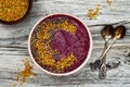 Acai breakfast superfoods smoothies bowl with chia seeds, bee pollen toppings. Immune boosting, anti inflammatory smoothie Royalty Free Stock Photo