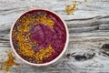 Acai breakfast superfoods smoothies bowl with chia seeds, bee pollen toppings. Immune boosting, anti inflammatory smoothie Royalty Free Stock Photo