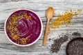 Acai breakfast superfoods smoothies bowl with chia seeds, bee pollen toppings. Immune boosting, anti inflammatory smoothie Royalty Free Stock Photo