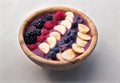 Acai cerry smoothie bowl with raspberries, bananas and blueberries Royalty Free Stock Photo