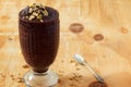 Acai frozen pulp juice in glass with muesli Royalty Free Stock Photo