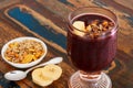 Acai in glass with muesli banana Royalty Free Stock Photo