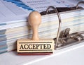 Accepted stamp with binder in the office Royalty Free Stock Photo