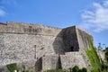 Access road and gate into the stone walls of the medieval castle in Ulcinj Royalty Free Stock Photo