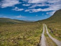 An access track winds through Glen Meavaig, home of the North Harris Eagle Observatory in the Outer Hebrides, Scotland, UK Royalty Free Stock Photo