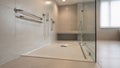 Accessible shower area featuring a spacious design highlighting the slipresistant pan and smooth tile finish with softly Royalty Free Stock Photo