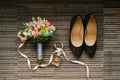 Accessories for the bride: shoes, wedding bouquet and eau de toilette Royalty Free Stock Photo