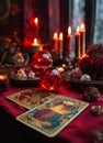 Accessories and candles for fortune telling on the table. Selective focus. Royalty Free Stock Photo